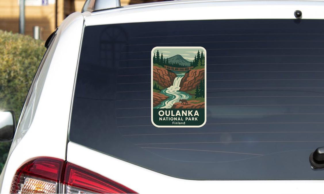 A sticker on the rear window of a car that says "Oulanka National Park Finland".