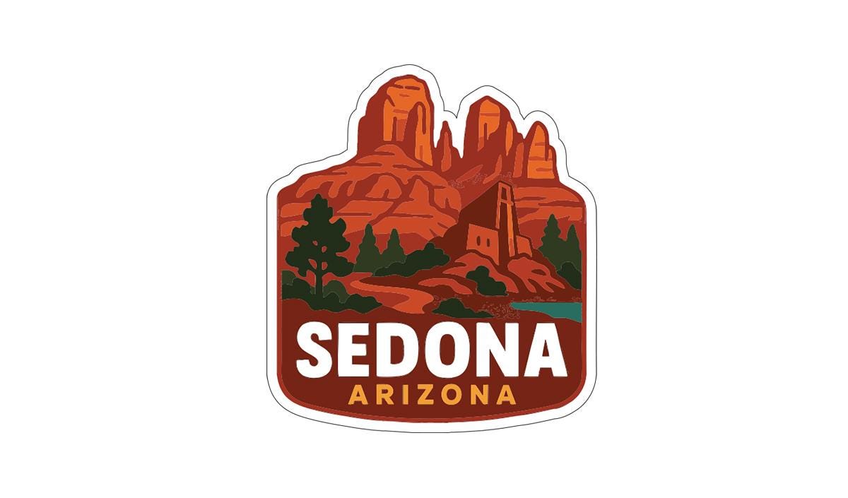 A sticker or emblem featuring the name 'SEDONA ARIZONA' along with an illustration of the iconic rock formations of Sedona, Arizona.