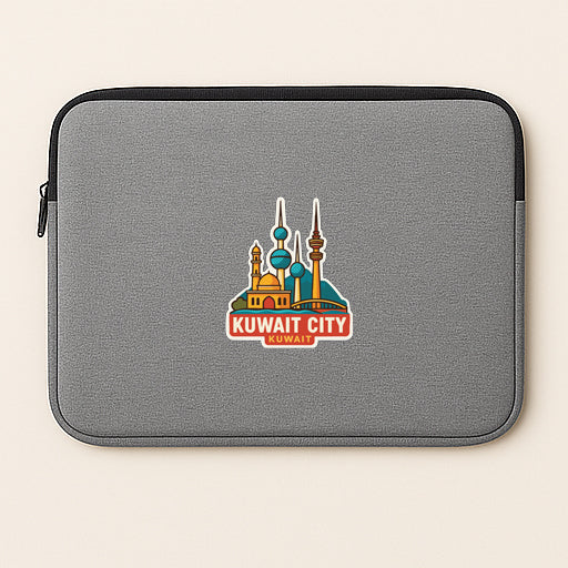 a gray laptop sleeve with a sticker depicting the Kuwait City skyline.