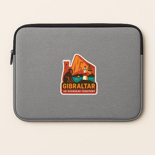 A gray laptop sleeve with a sticker depicting a mountain landscape and the text "GIBRALTAR UK OVERSEAS TERRITORY".