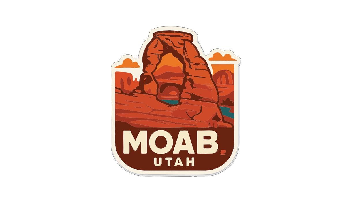 A sticker or emblem featuring the iconic natural landmark, the Moab in Utah.