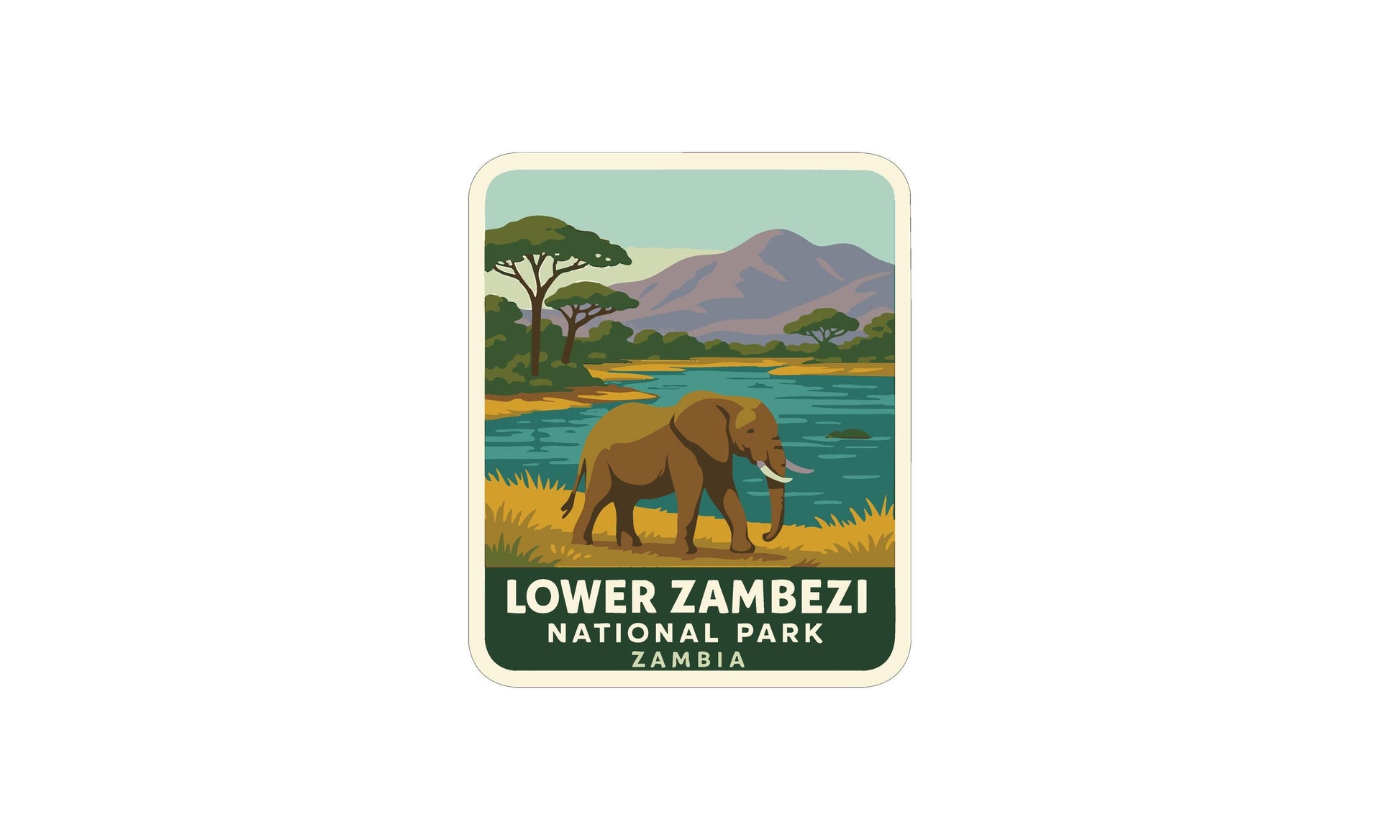 an elephant walking in a grassy area near a body of water, with mountains in the background.
