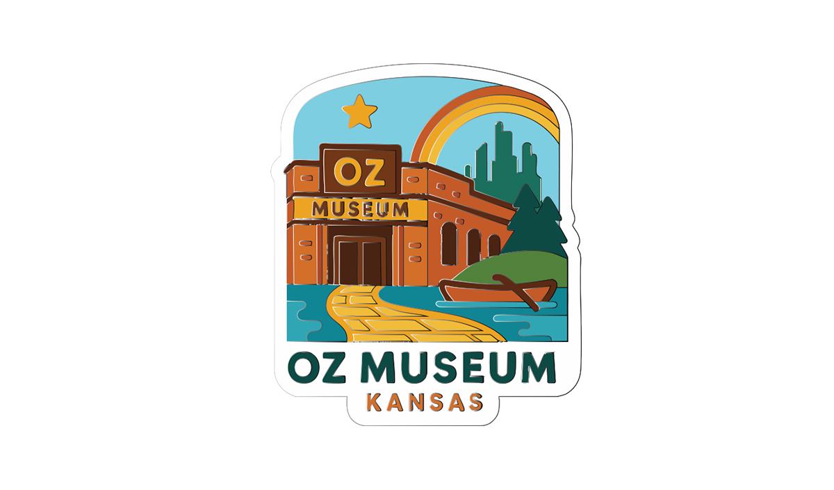 a sticker or emblem depicting the Oz Museum in Kansas.