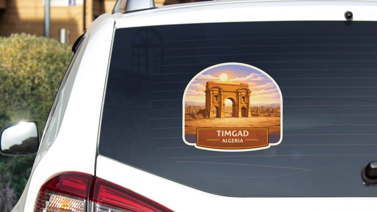 A sticker on the rear window of a car, depicting the Algiers Arch in Algeria.