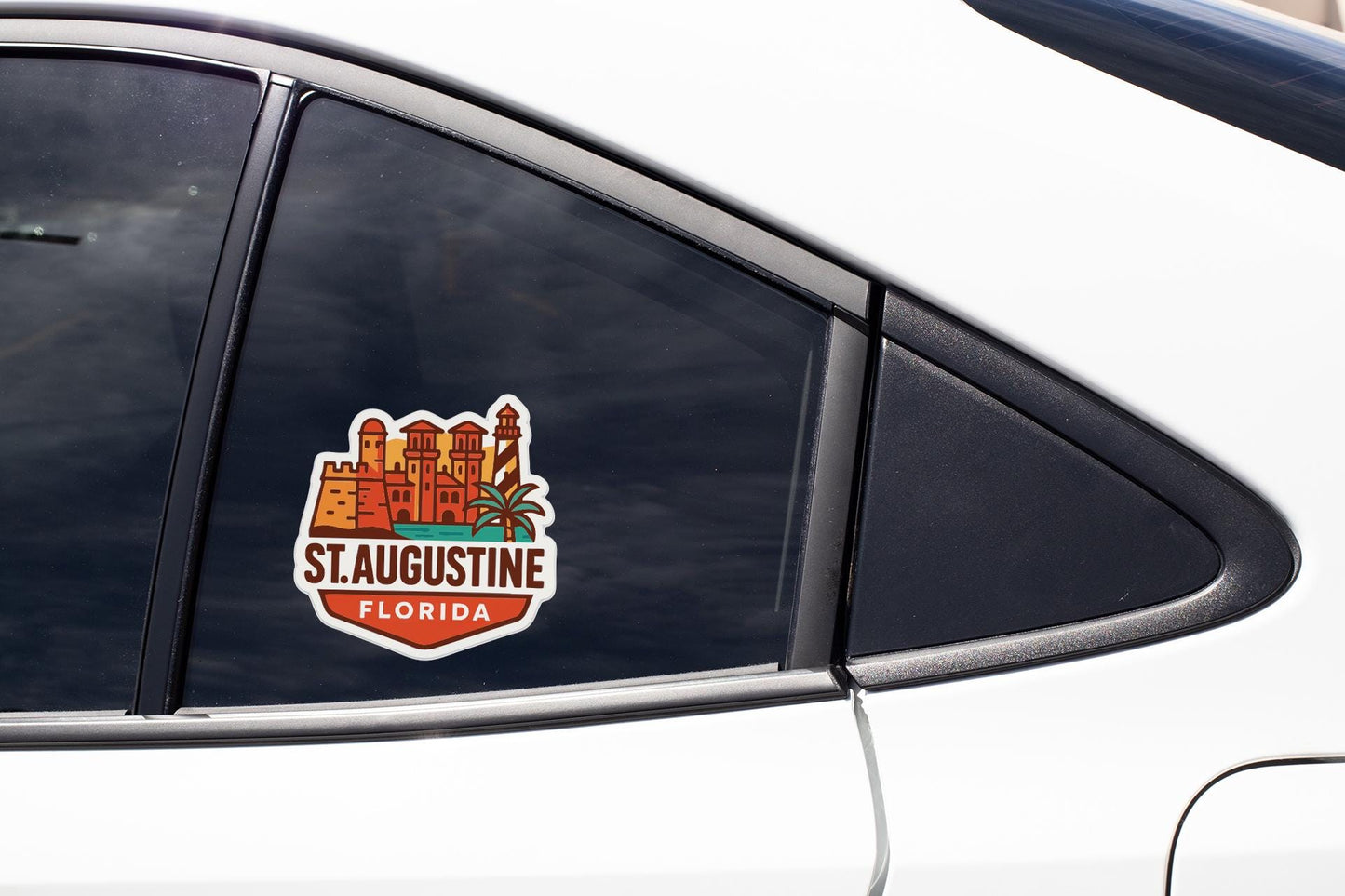 A sticker on the side of a car window that says "St. Augustine, Florida".