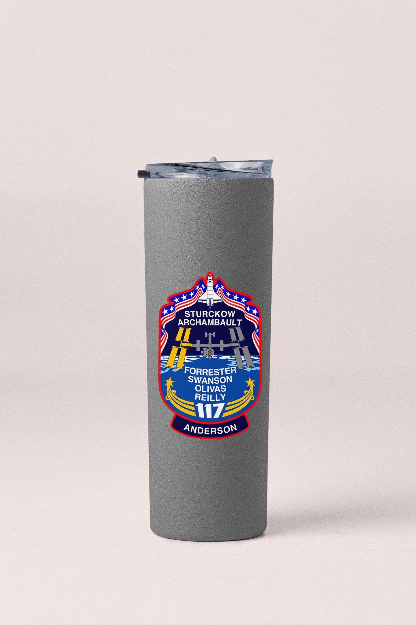 a stainless steel tumbler cup with a picture of an airplane on it