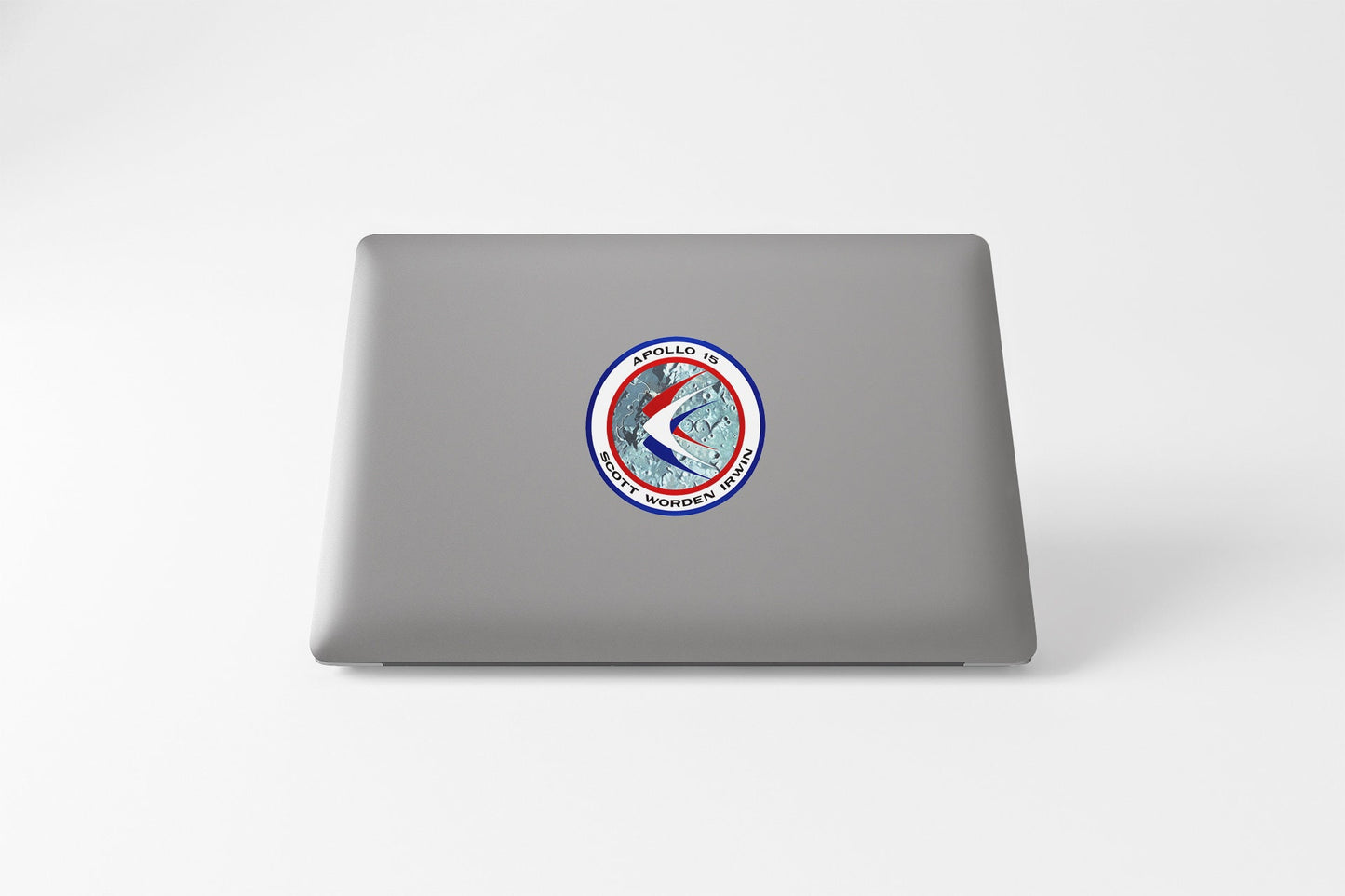 a laptop computer sitting on top of a white table