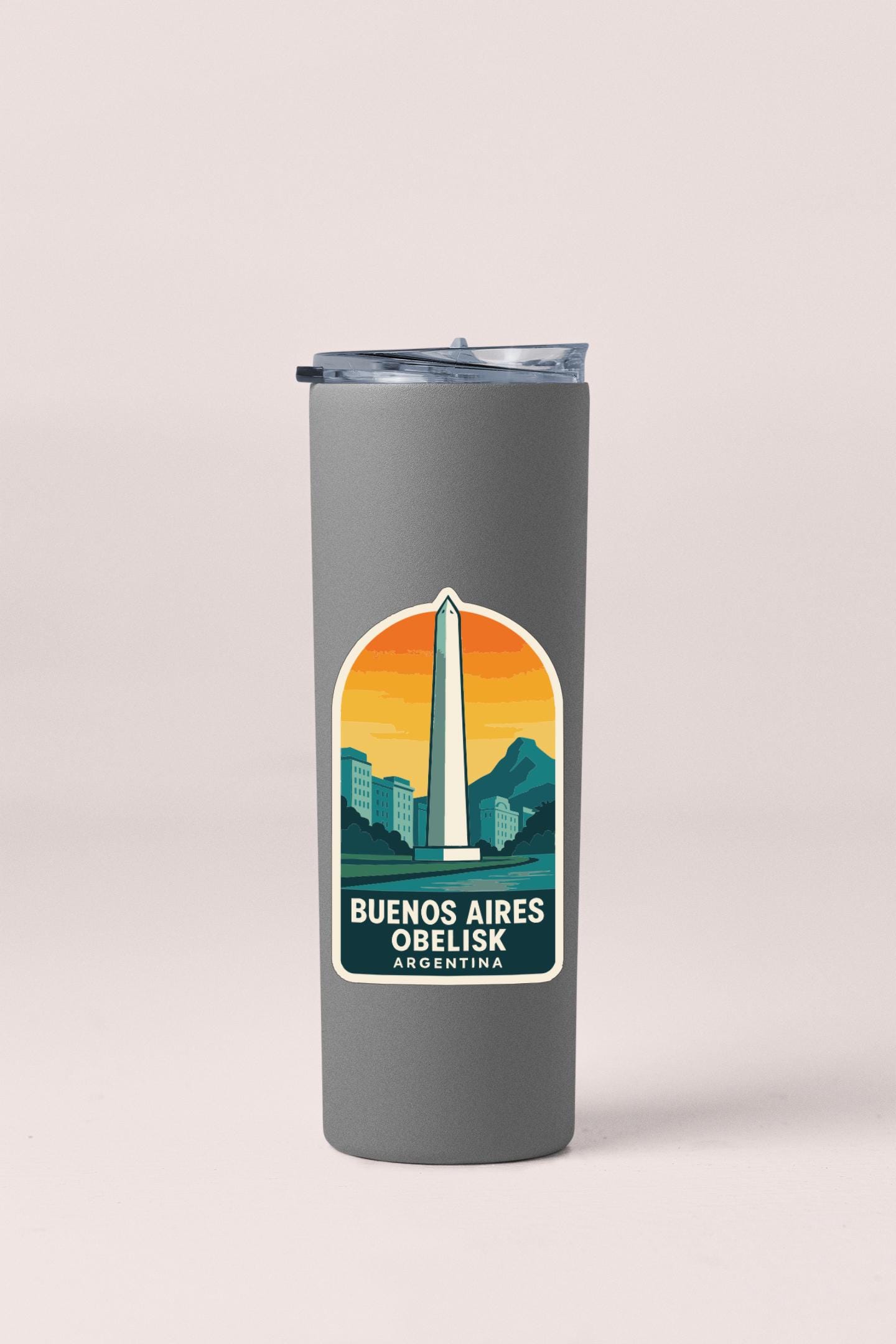 A gray tumbler with a label that says "Buenos Aires Obelisk Argentina" on it.