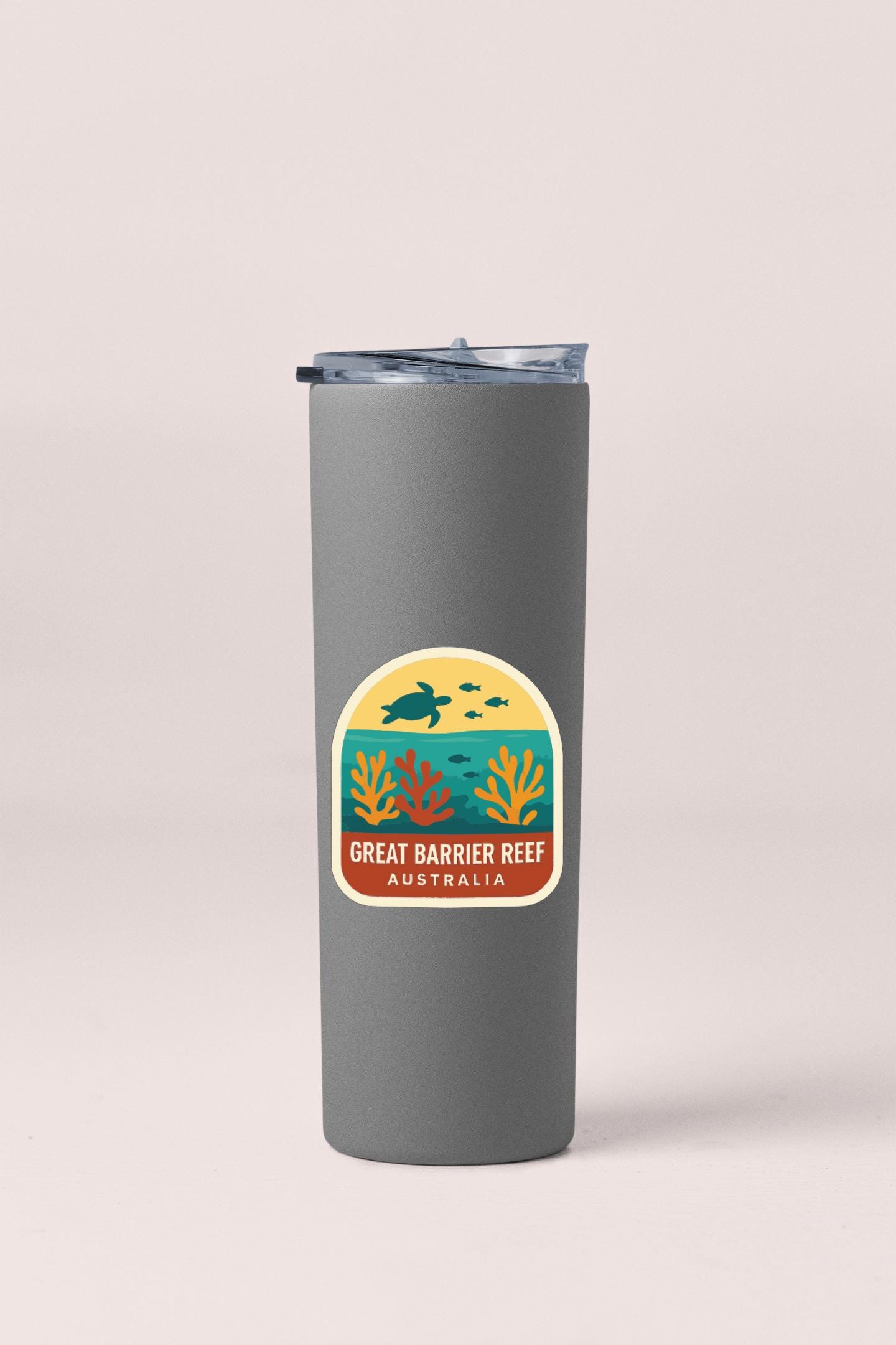 A gray insulated tumbler with a label that says "Great Barrier Reef Australia".