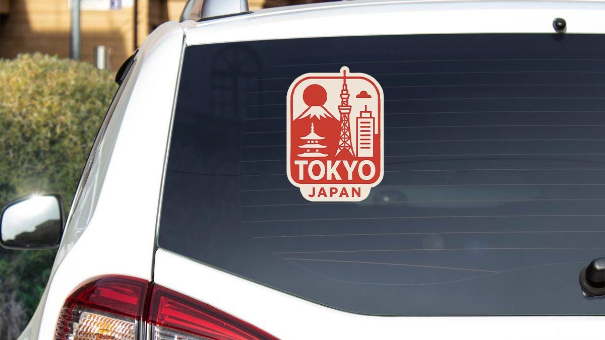 a sticker on the back of a car that says tokyo