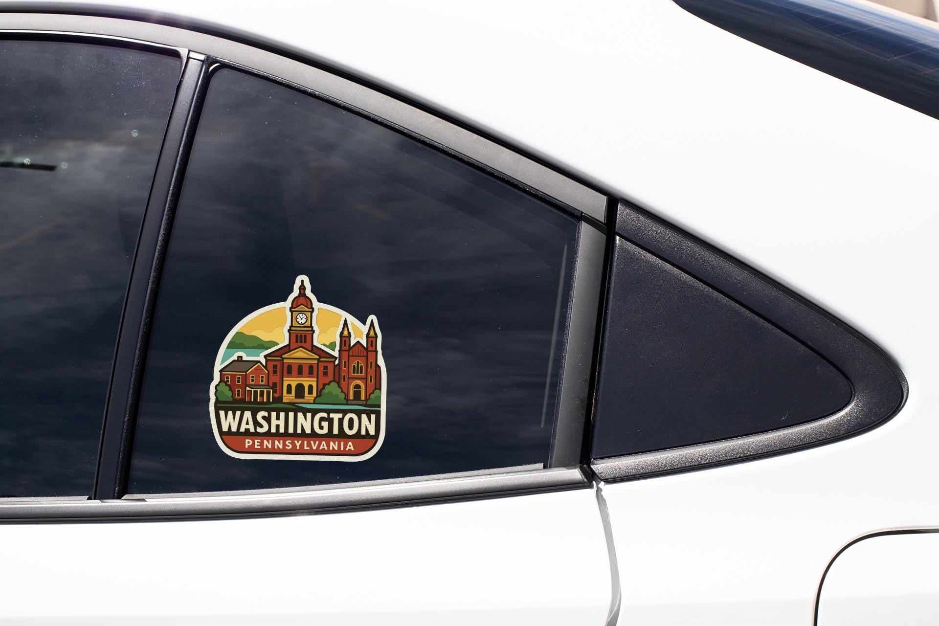 A sticker on the side of a car window, depicting a cityscape with a clock tower and the text "WASHINGTON, PENNSYLVANIA".