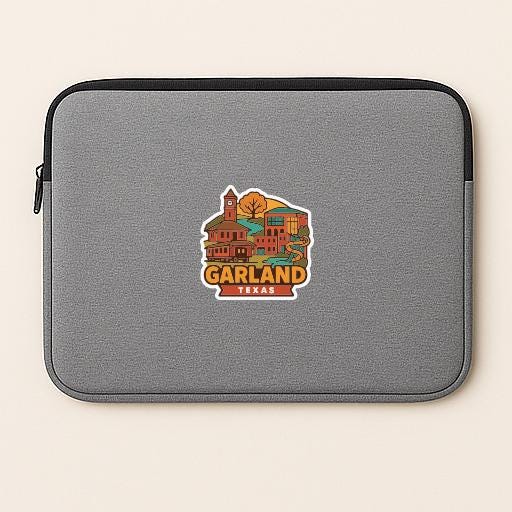 A gray laptop sleeve with a sticker of a cityscape and the text "GARLAND TEXAS" printed on it.