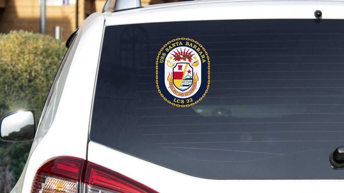 a car with a sticker on the back of it