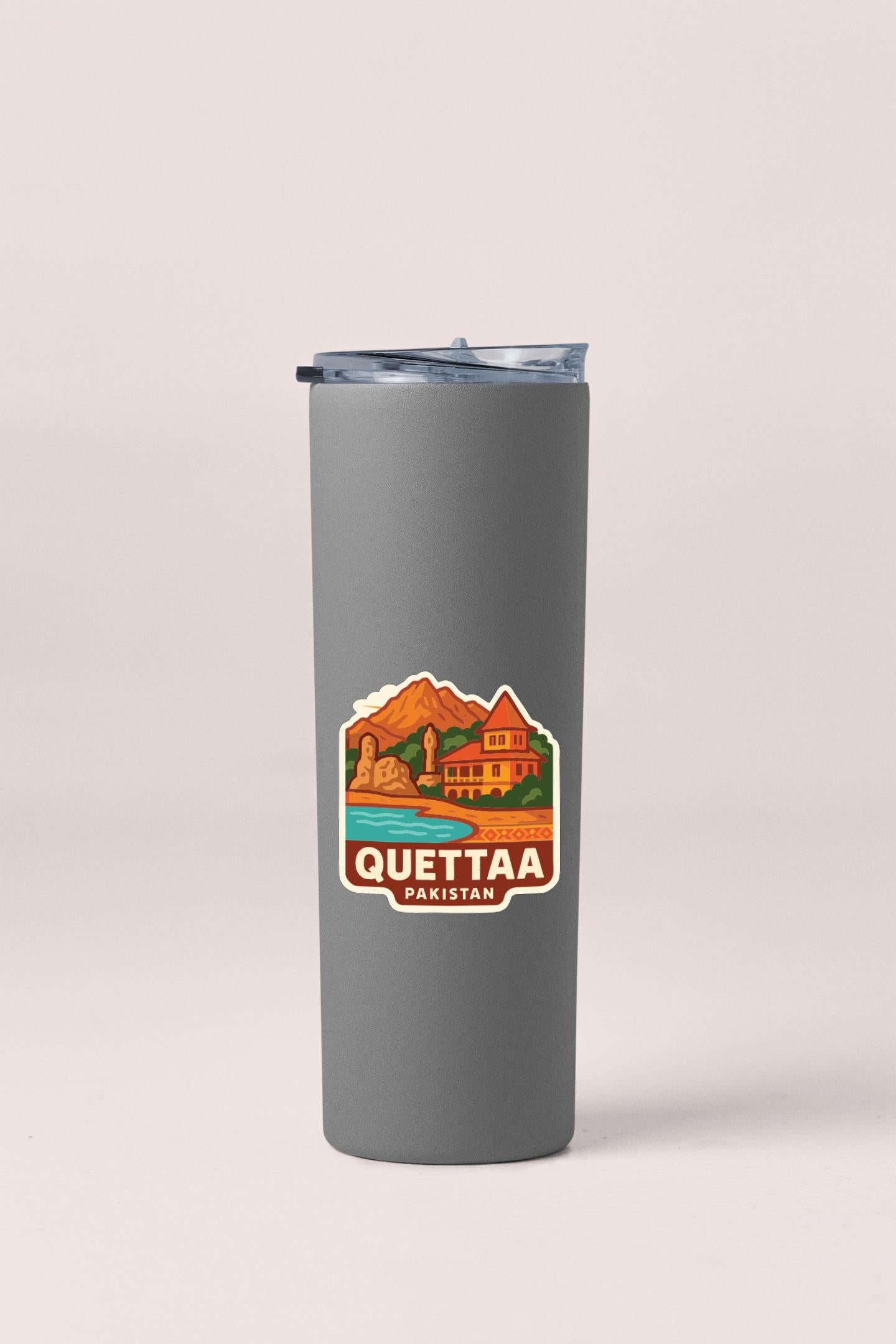 A gray insulated tumbler with a sticker depicting a scenic landscape and the text "Quettaa Pakistan" printed on it.