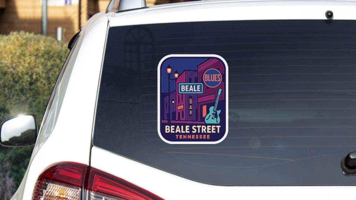 a sticker on the rear window of a white car, depicting a street scene with a blue and purple background, a building, and a guitar.