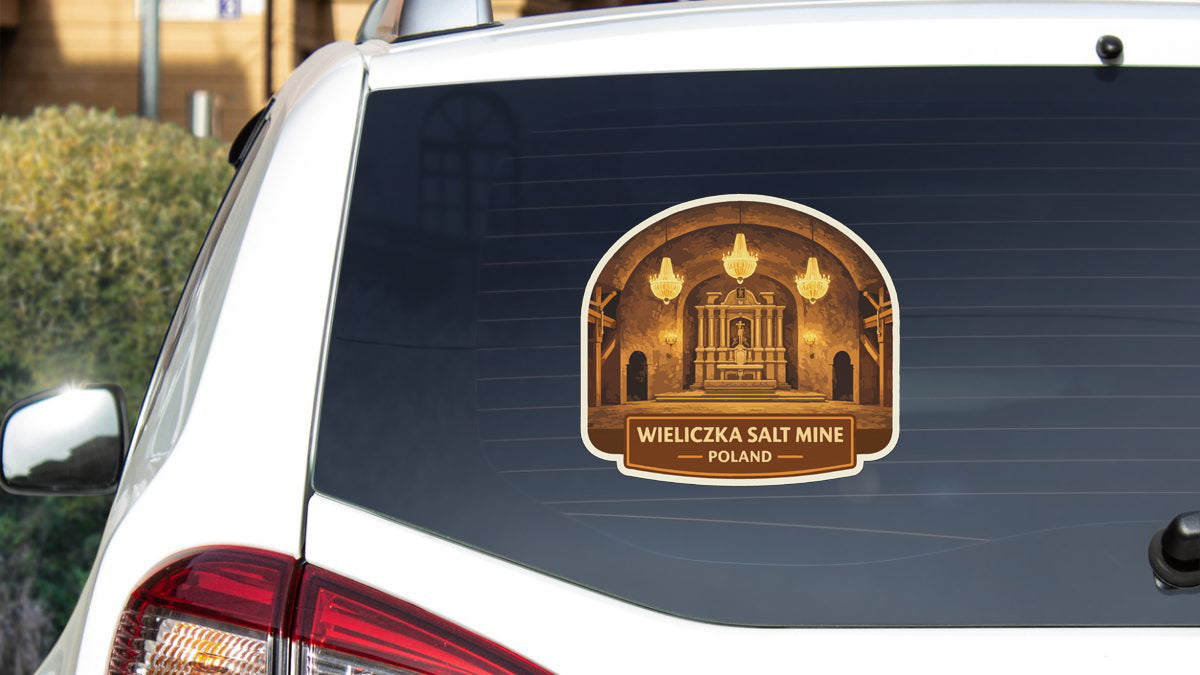 a sticker on the rear window of a car, depicting a church with a cross and chandeliers.