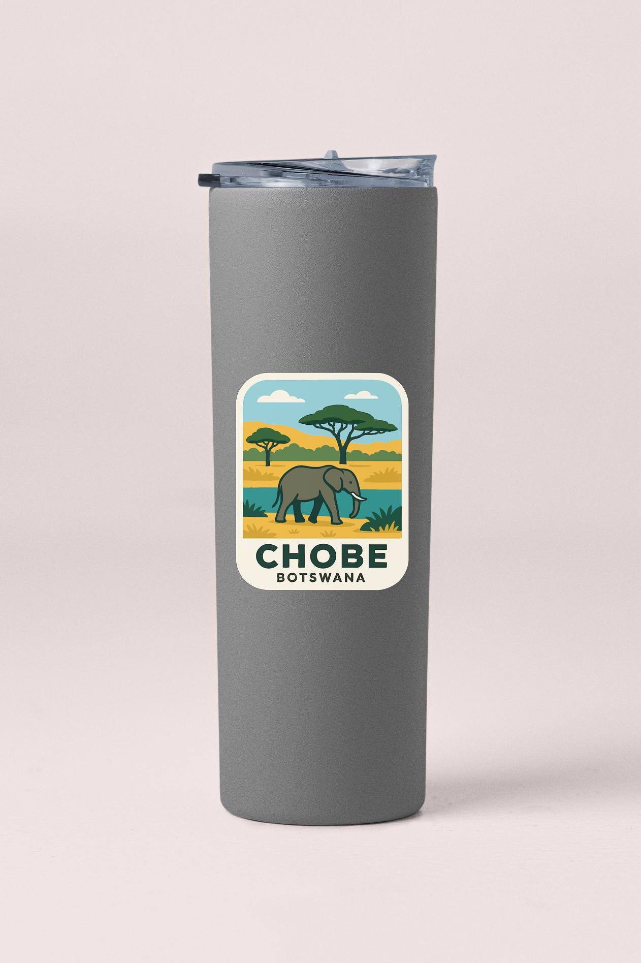 A gray tumbler with a sticker depicting an elephant and the text "CHOBE BOTSWANA" printed on it.