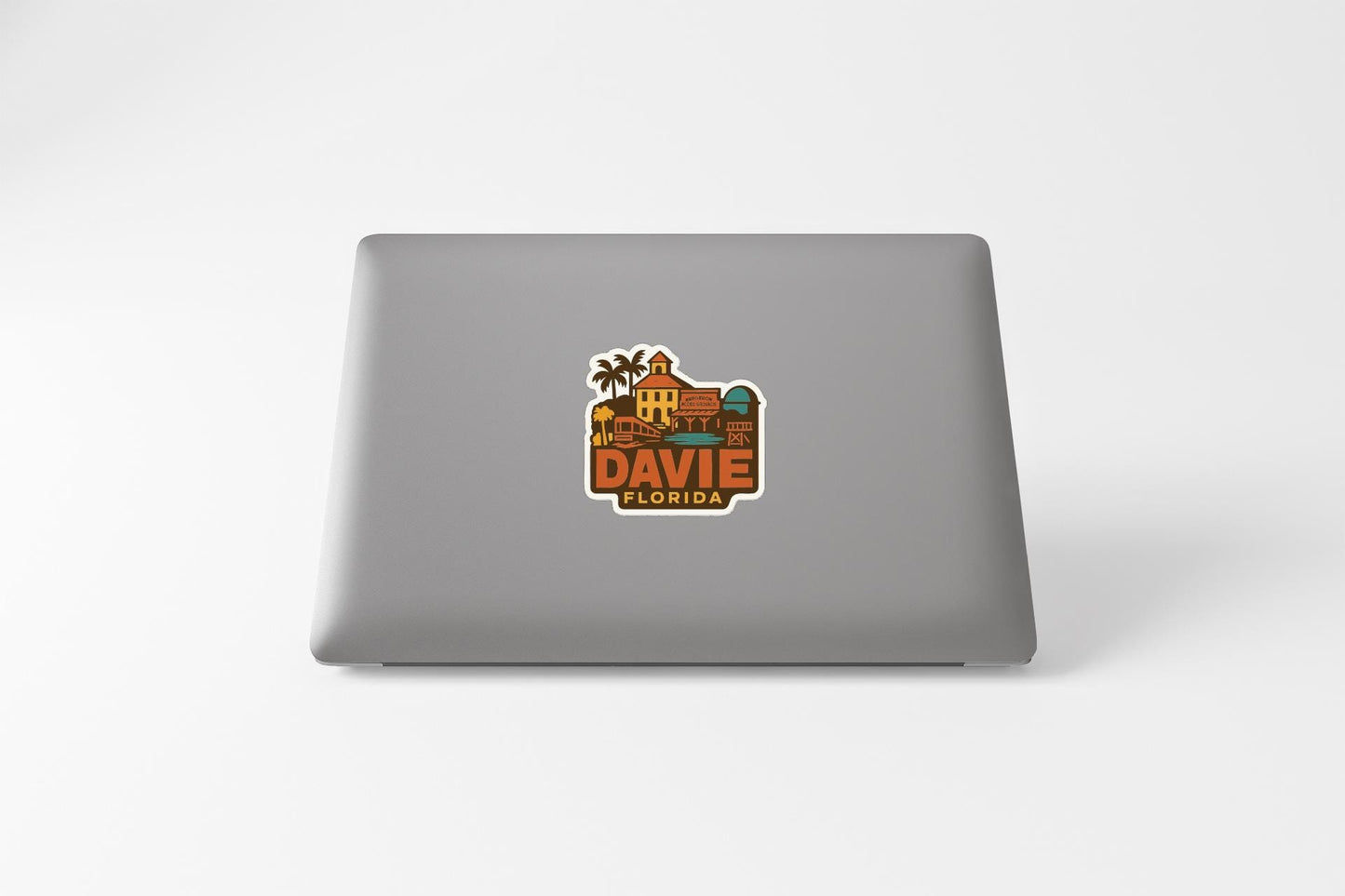 a sticker with a graphic of a building and palm trees, along with the text "DAVID FLORIDA".