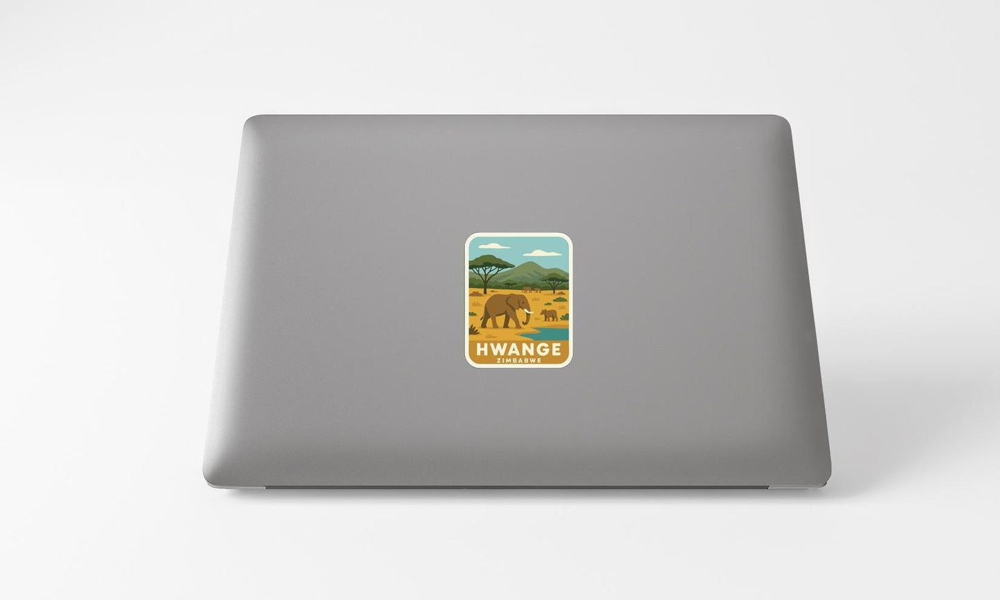 A sticker on the back of a laptop displaying an illustration of a safari scene with an elephant and other wildlife.