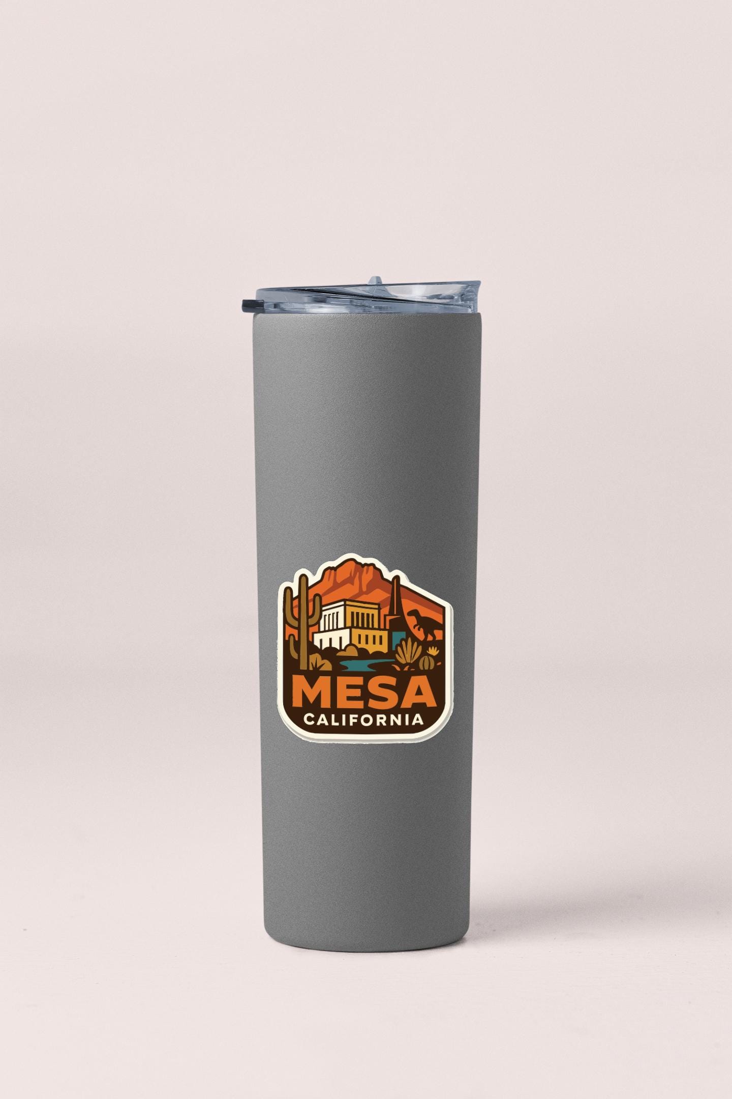 A gray insulated tumbler with a label that says "MESA CALIFORNIA".