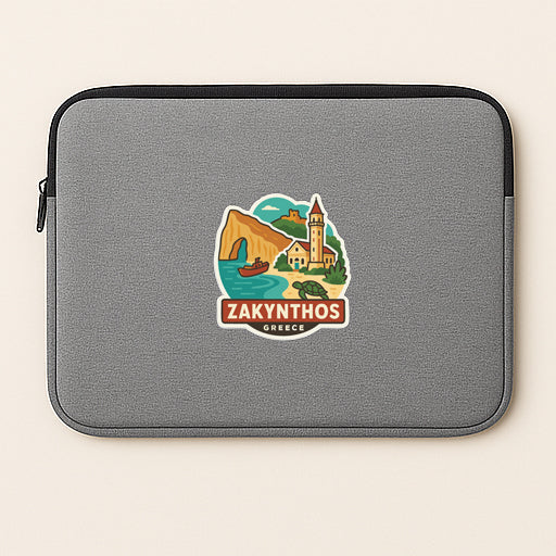 A gray laptop sleeve with a sticker depicting a scenic view of Zakynthos, Greece.