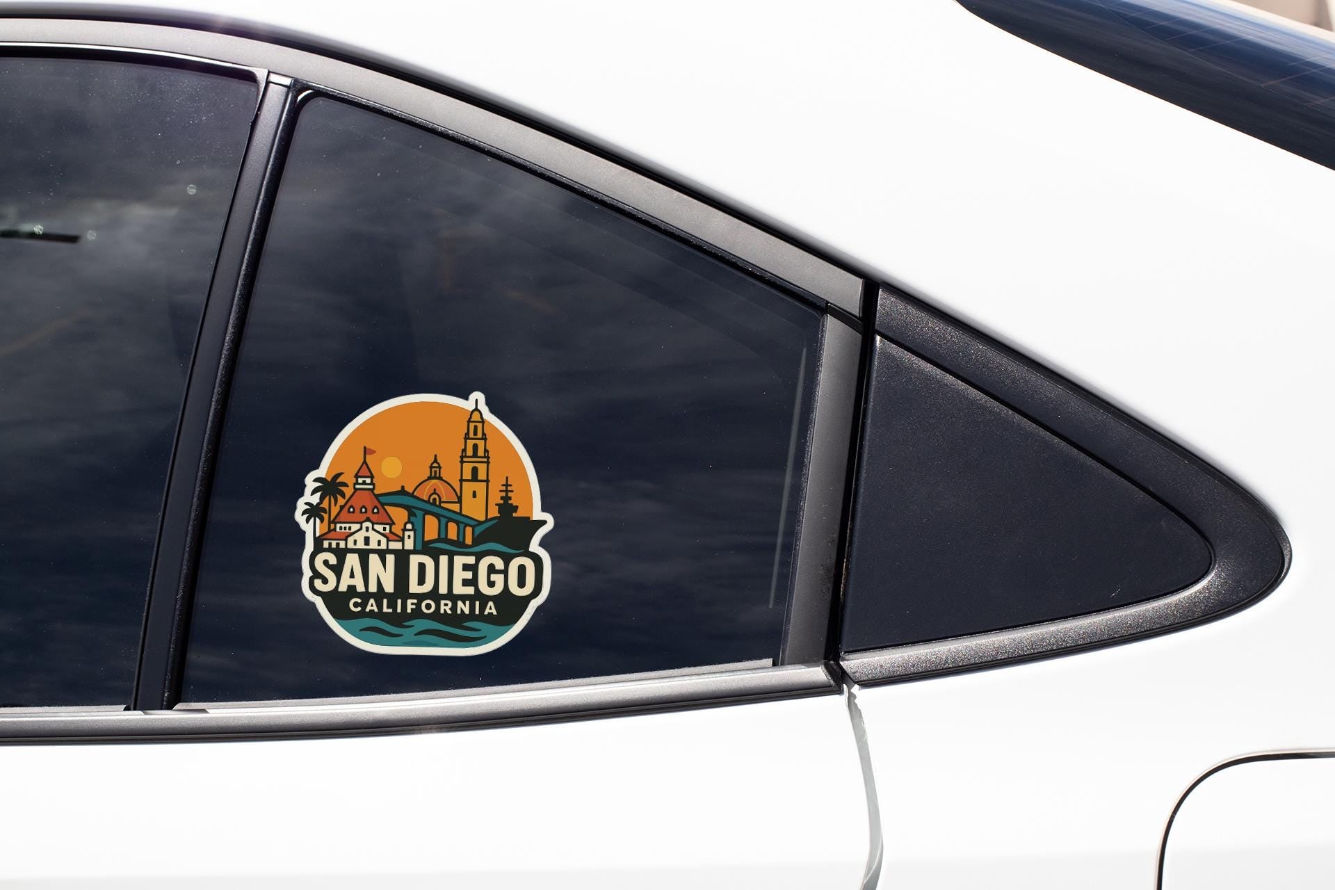 A sticker on the side of a car window, featuring the image of San Diego, California.