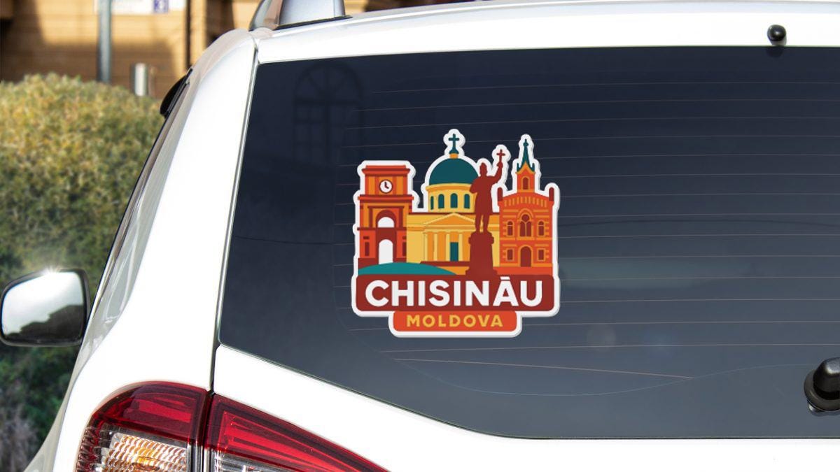 A sticker on the rear window of a car displaying the image of the Chisinau Moldova.