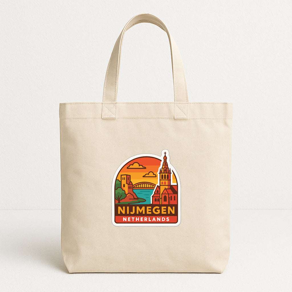 A beige tote bag with a graphic design depicting a cityscape and the text "Nijmegen Netherlands" printed on it.