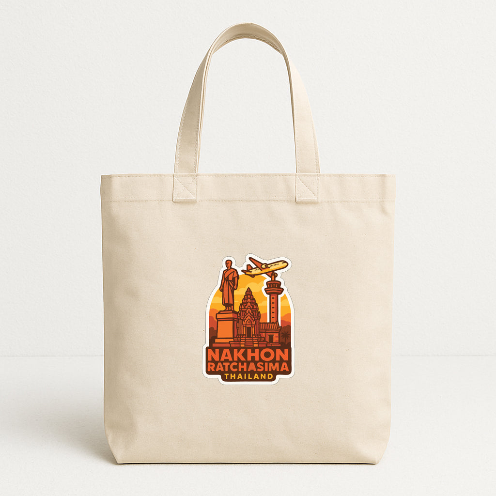 A beige tote bag with a printed design depicting a landmark in Thailand, specifically Nakhon Ratthamma, which is a famous temple in Chiang Mai.
