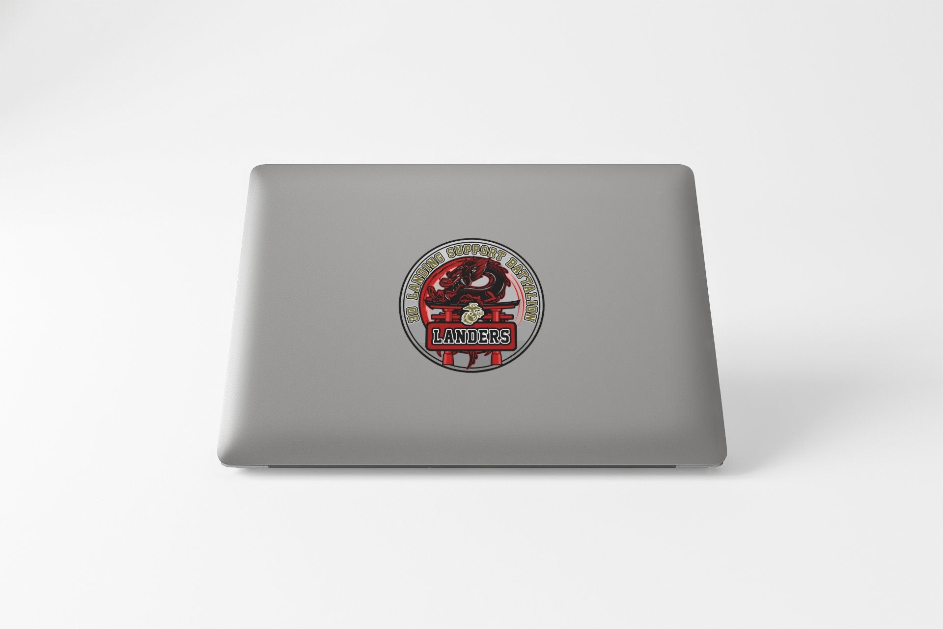 a laptop computer with a sticker on it