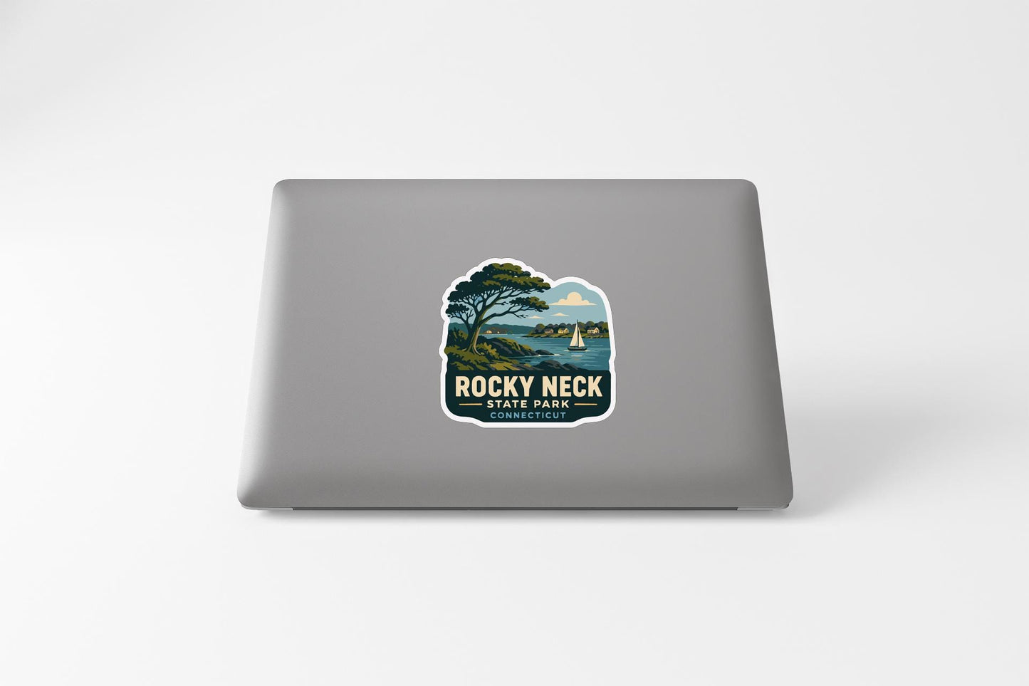 a sticker on the back of a laptop that says "ROCKY necks CONNECTICUT".