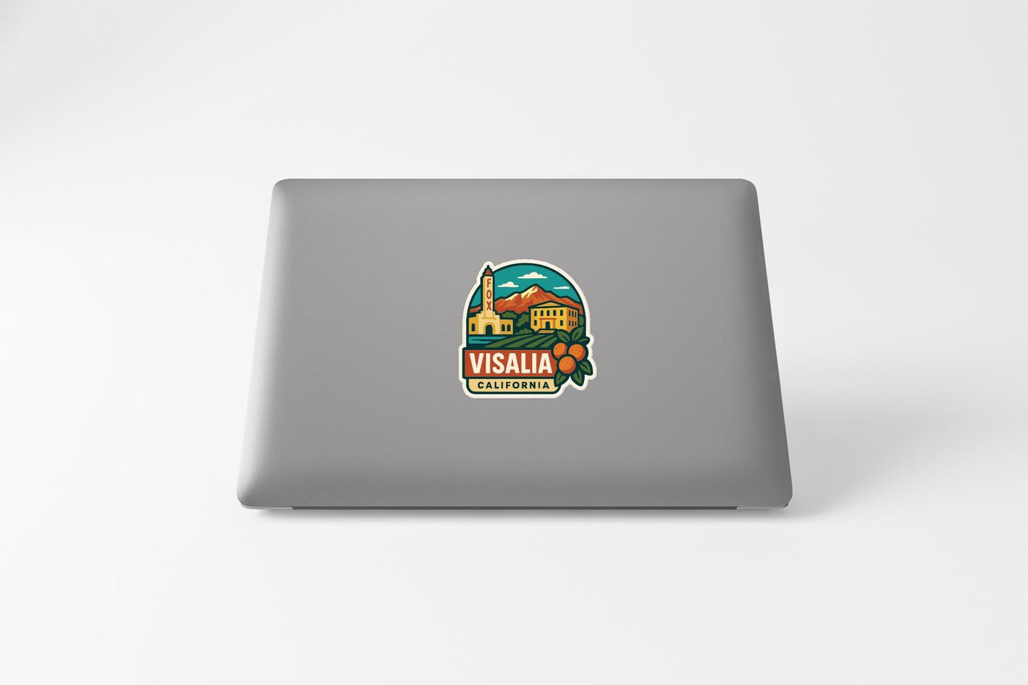 a sticker or decal of Visalia, California, on the back of a laptop computer.