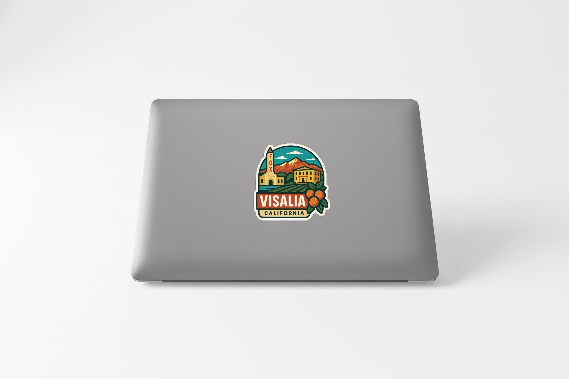 a sticker or decal of Visalia, California, on the back of a laptop computer.