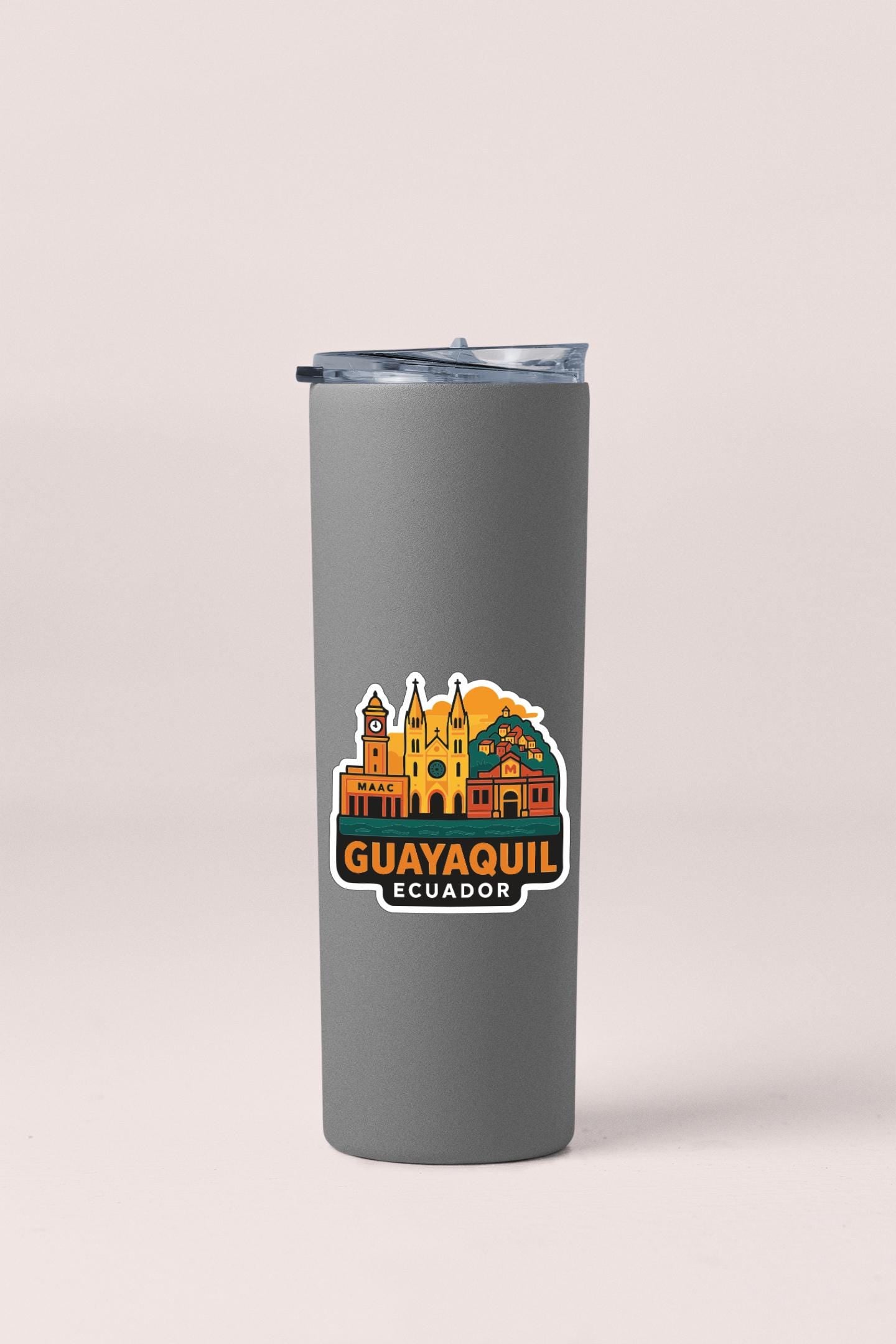 A gray insulated tumbler with a printed sticker depicting the cityscape of Guayaquil, Ecuador.