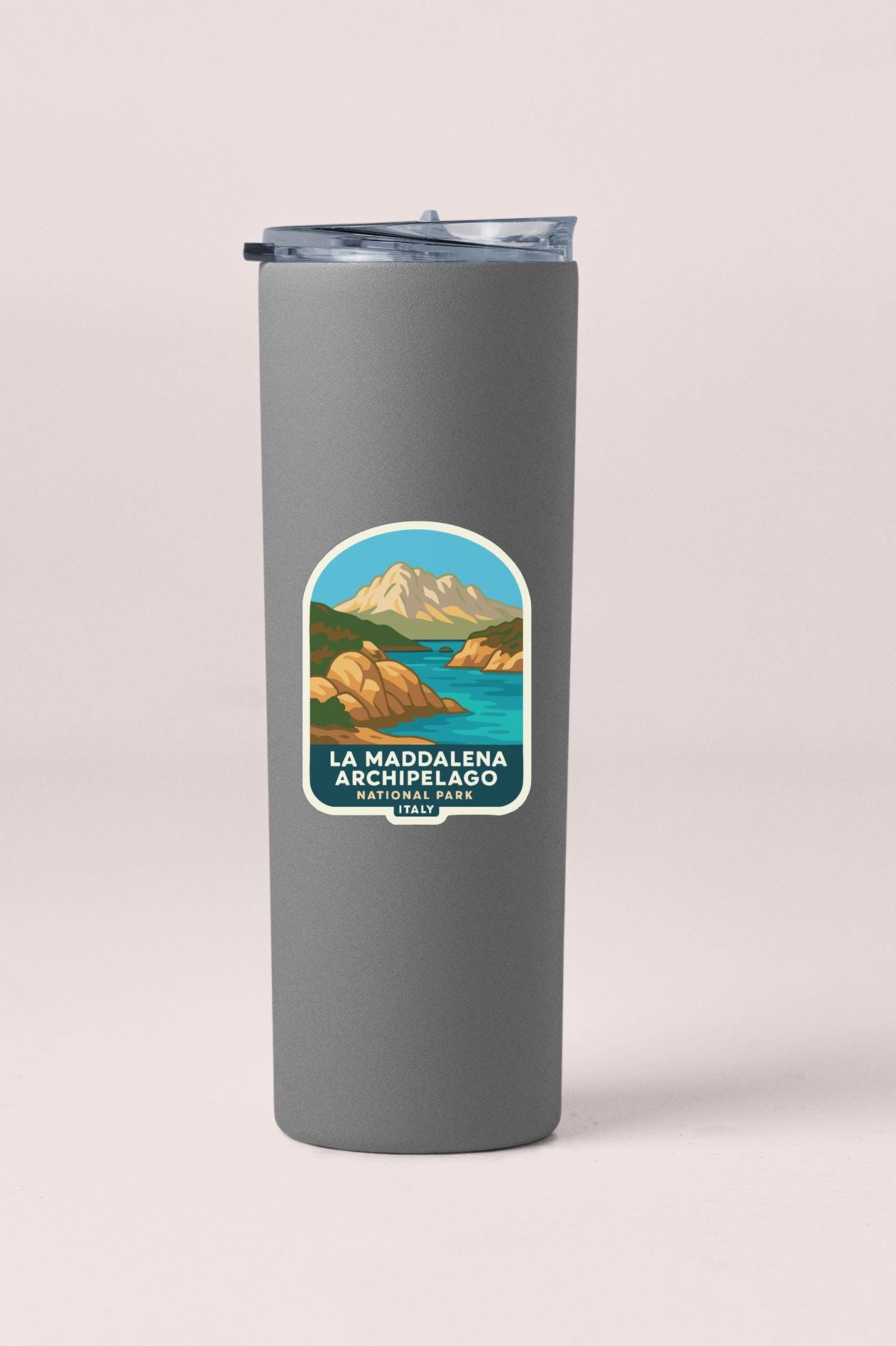 A gray cylindrical container with a label that features an illustration of a mountain landscape and the text "LA MADALENA ARCHIPELAGO NATIONAL PARK ITALY".