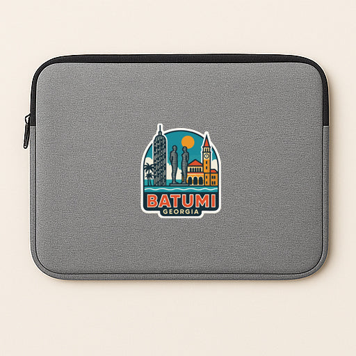 A gray laptop sleeve with a graphic design depicting the skyline of Batumi, Georgia.