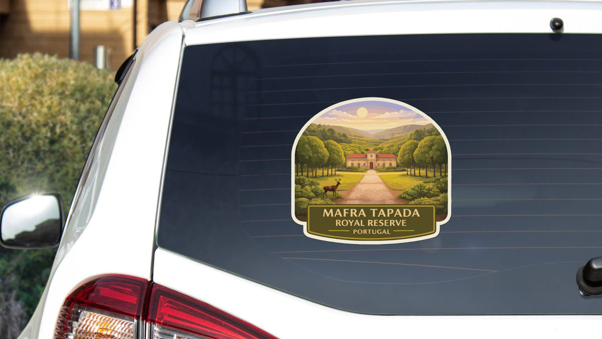 a sticker on the rear window of a car, depicting a scenic landscape with a building and a path leading to a house.