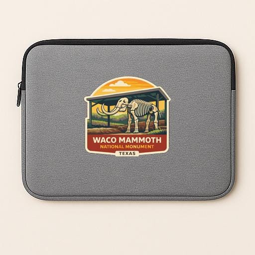 a gray laptop sleeve with a graphic design depicting a skeleton of a woolly rhinoceros, which is the logo for the Waco Mammoth National Monument in Texas.