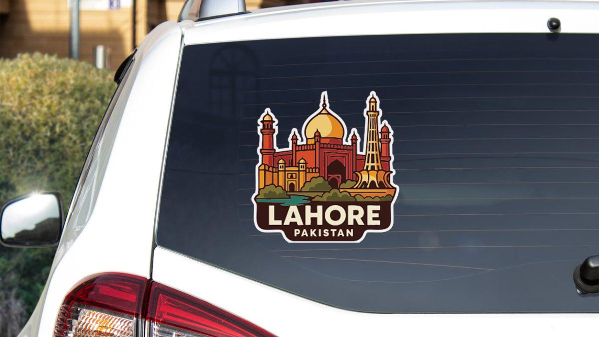 A sticker on the rear window of a car that features an illustration of the Taj Mahal, a famous monument in Lahore, Pakistan.