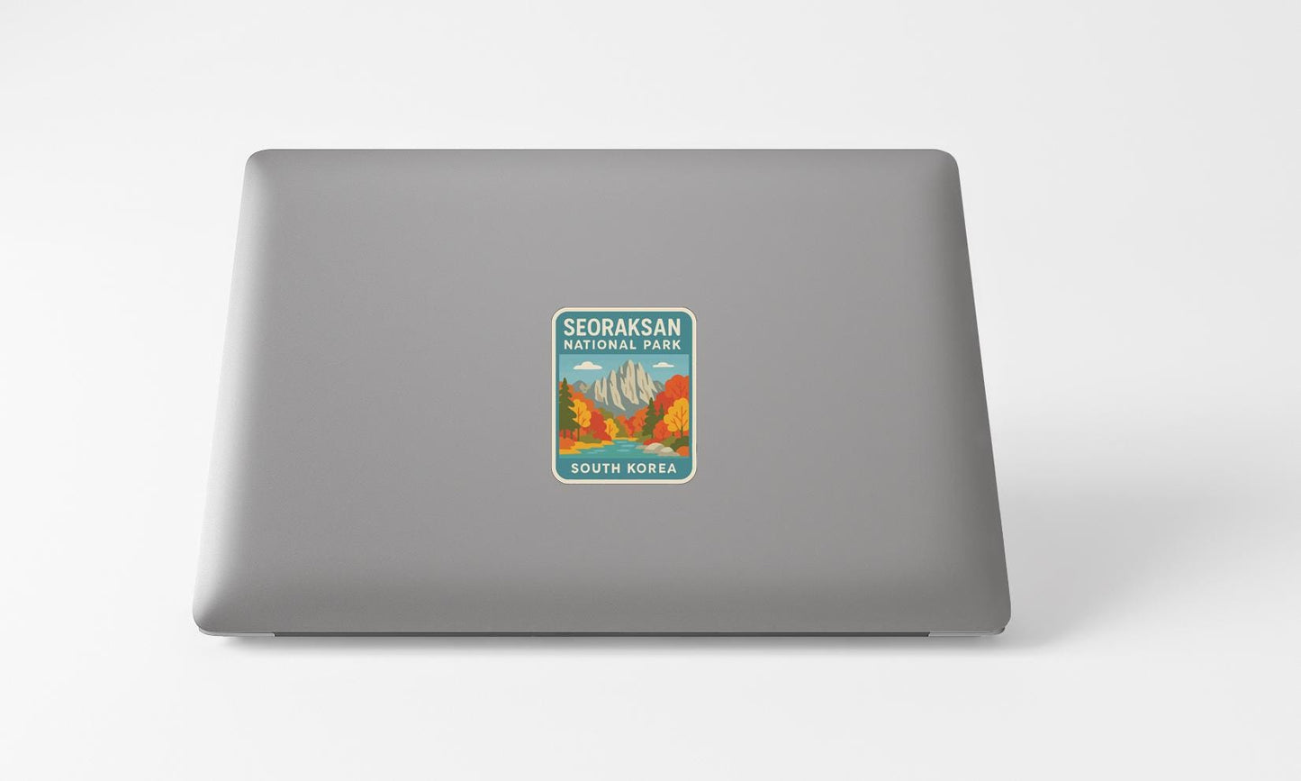 A sticker on the back of a laptop displaying the Seoraksan National Park logo and text.