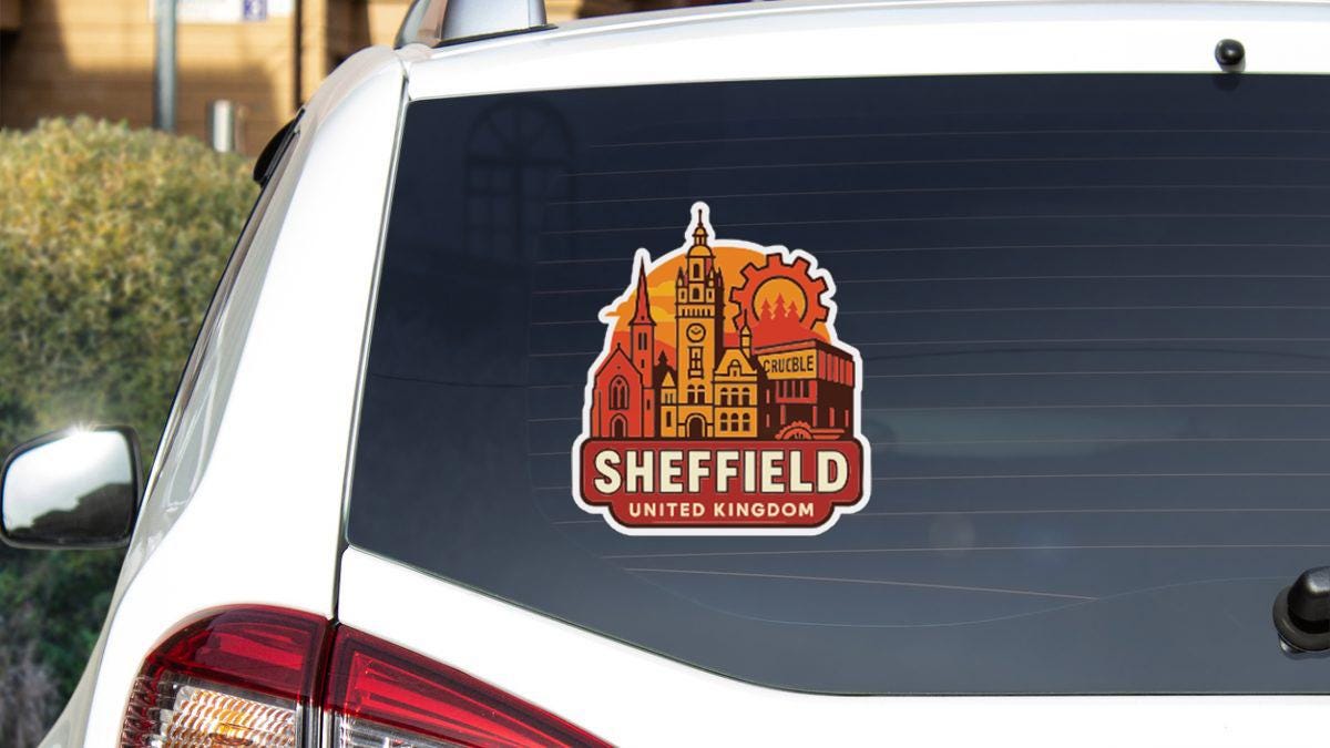 A sticker on the rear window of a car that displays the city of Sheffield, United Kingdom.
