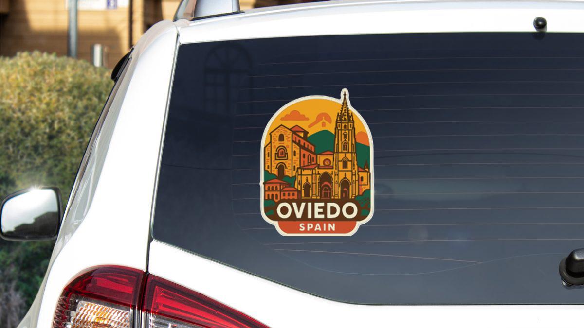 a sticker on the rear window of a car that says "OVIEDO, SPAIN".