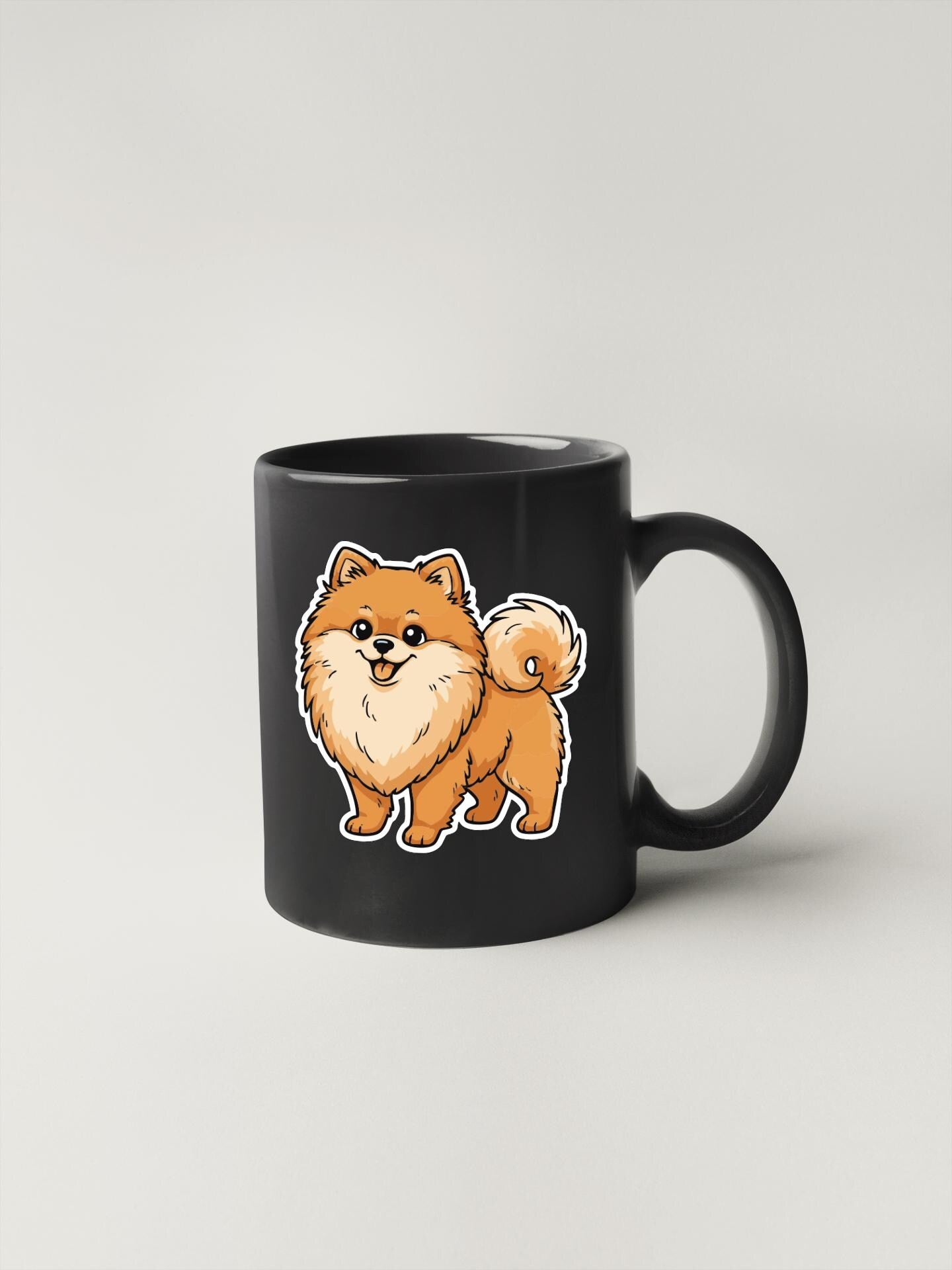 A black coffee mug with a cartoon illustration of a Pomeranian dog on it.