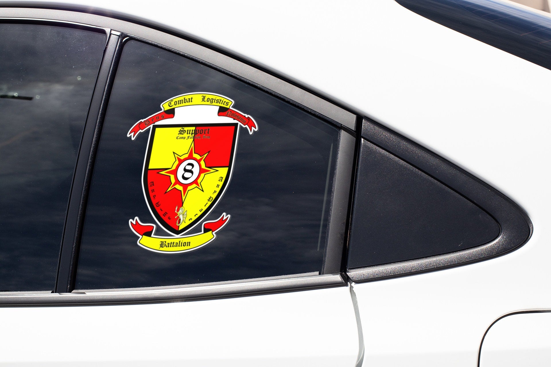a close up of a car window with a sticker on it