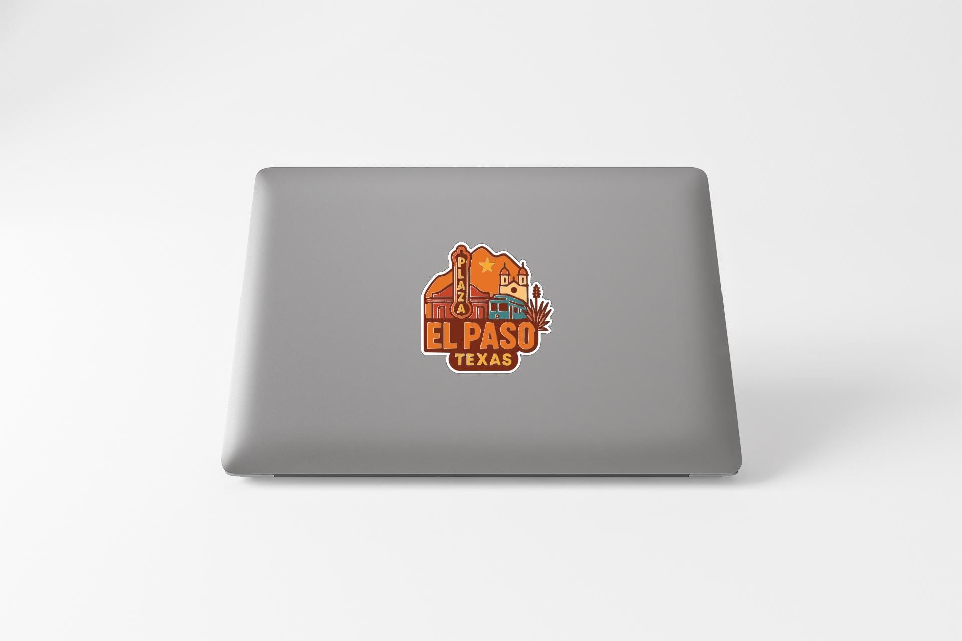 a sticker on the back of a laptop that says "EL PASO TEXAS".