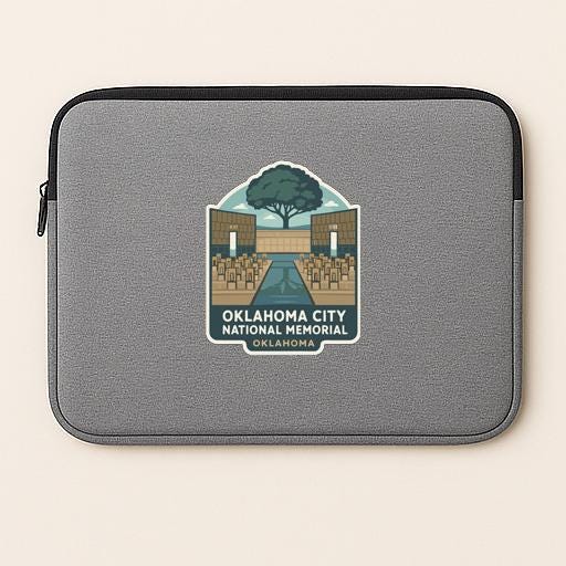 a gray laptop sleeve with a logo for Oklahoma City National Memorial.