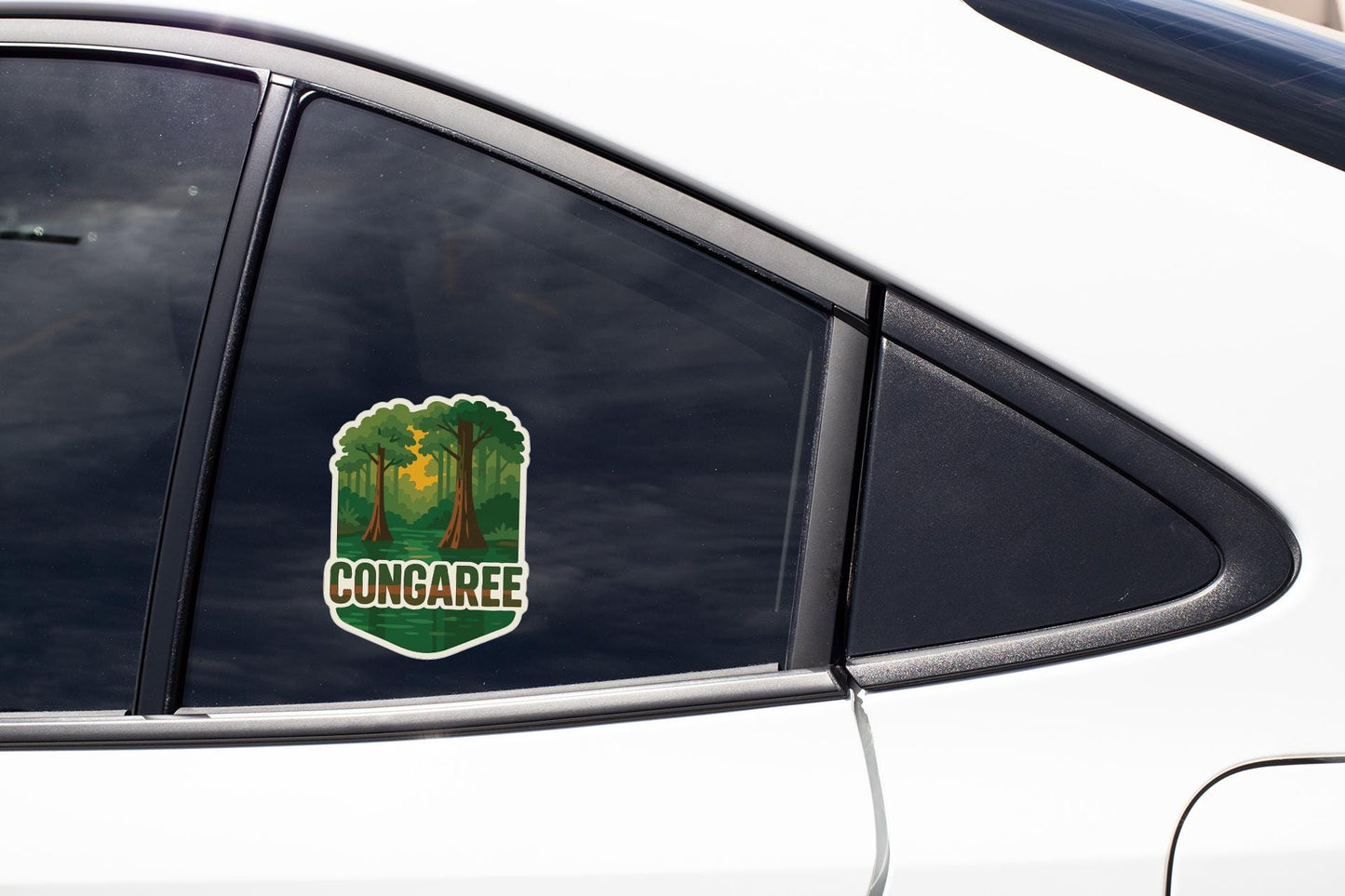 A sticker on the side of a car window that says "CONGAREE".
