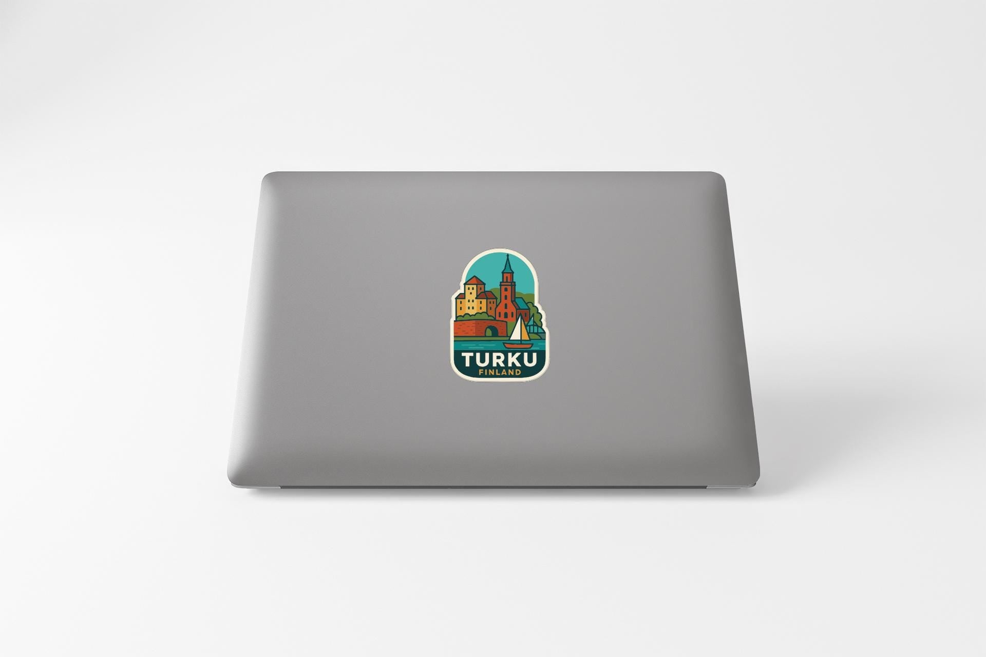 A sticker featuring a colorful illustration of a building with the word 'TURKU' prominently displayed.