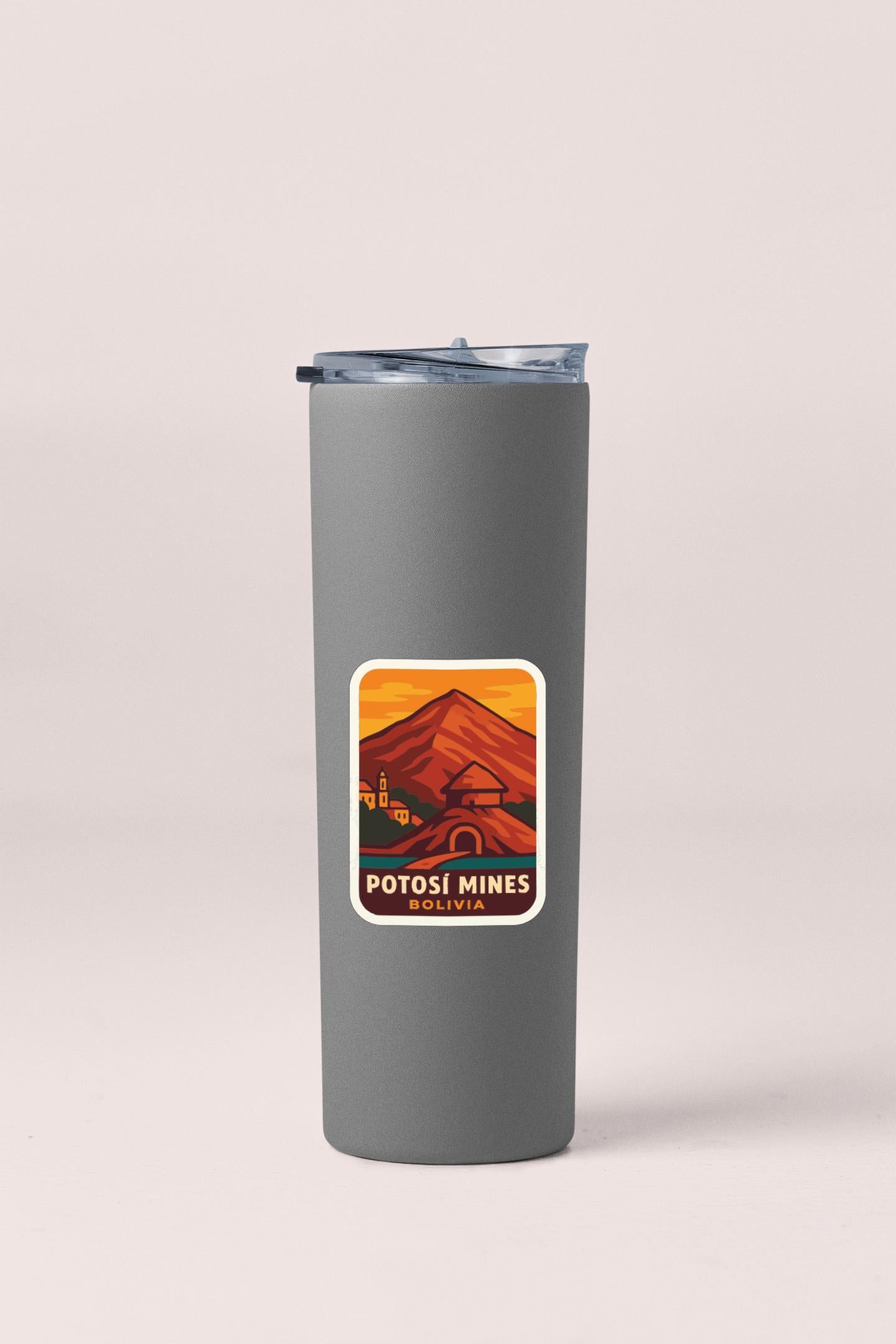 A gray insulated tumbler with a sticker depicting a mountain landscape and the text "POTOSI MINES BOLIVIA".