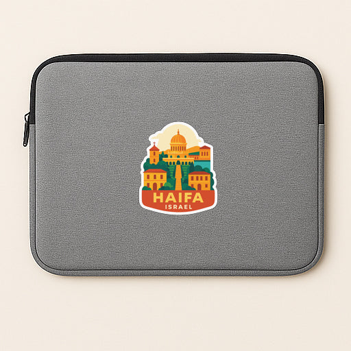 A gray laptop sleeve with a sticker of a cityscape and the text "HAIFA ISRAEL" printed on it.